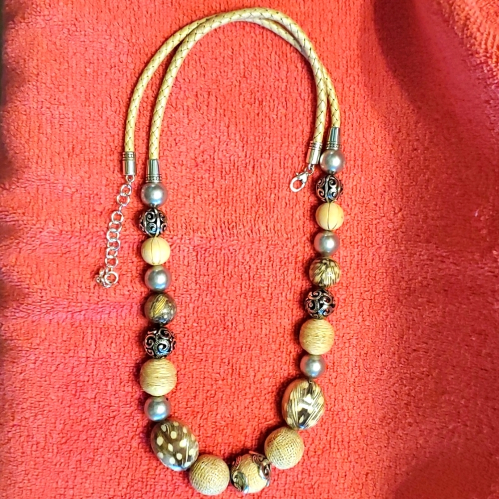 Brighton (drop 15 inch)necklace on braided tan cord